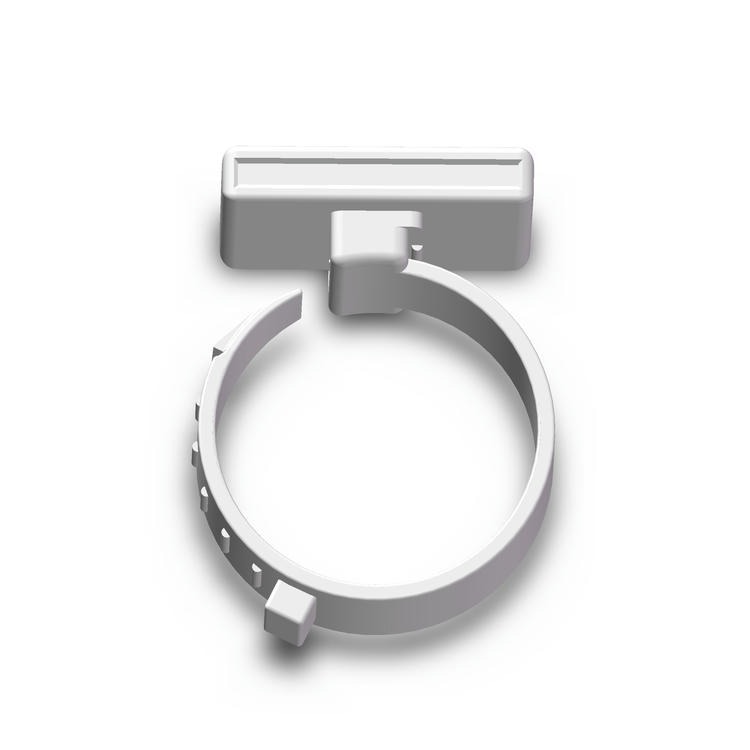 Голямо количество RFID пръстени F010 за крака на животни, показващо складова наличност за доставчици в птицевъдството.