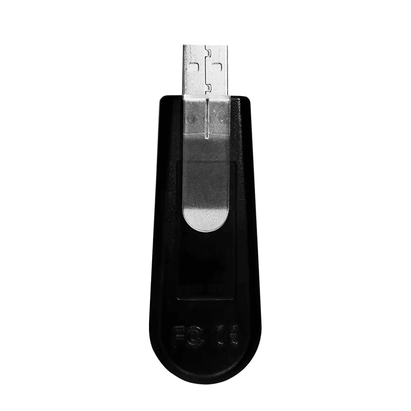 Задната страна на ACR1251T USB token reader е показана с метална щипка и напълно изваден USB конектор.